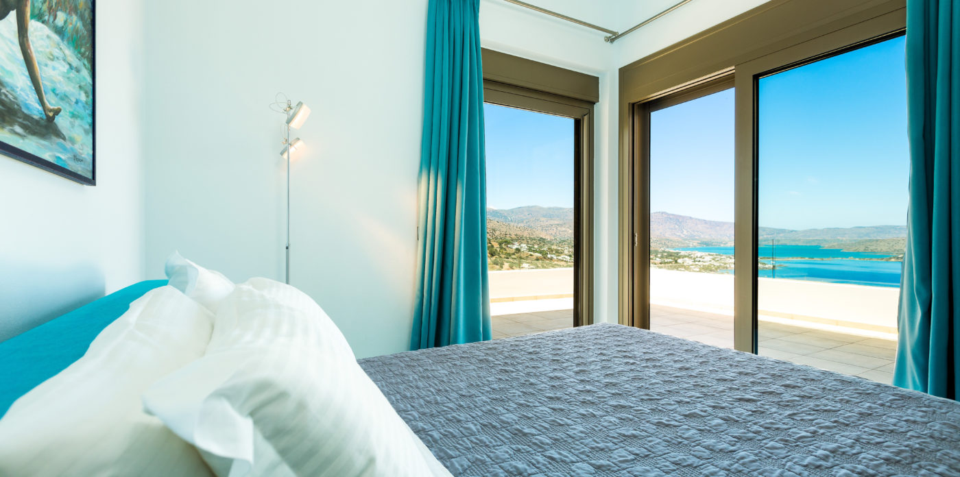 One of the bedrooms with sea views villa for sale in Crete Greece