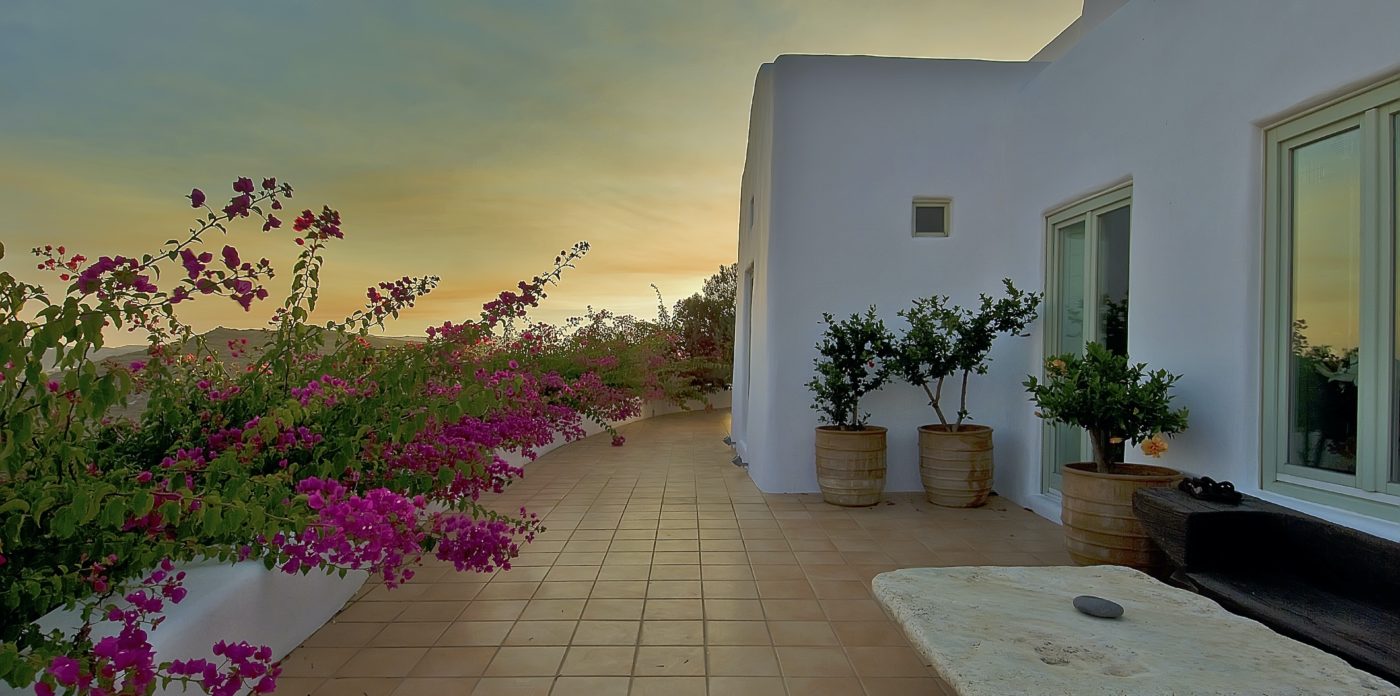 Bursts of fuchsia pink bougainvillea, property for sale in Mykonos, Greece